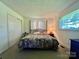 Comfortable bedroom with neutral carpet, a ceiling fan and good natural light at 1229 Rocky Face Church Rd, Taylorsville, NC 28681