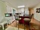 Kitchen featuring white cabinets, modern appliances, and a breakfast bar with seating at 1229 Rocky Face Church Rd, Taylorsville, NC 28681