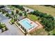 Aerial image of a community pool with ample parking, a bathhouse and lounge chairs at 139 Batten Ridge Dr, Statesville, NC 28677