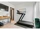Home exercise room with a treadmill, desk, and art, perfect for staying active and productive at 139 Batten Ridge Dr, Statesville, NC 28677