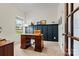 Bright home office with a traditional desk, carpet, and built-in shelving at 139 Batten Ridge Dr, Statesville, NC 28677