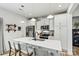 Modern kitchen with stainless steel appliances, and a breakfast bar at 139 Batten Ridge Dr, Statesville, NC 28677