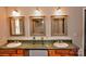 Bathroom with double sinks and well-lit mirrors offers a perfect space for daily routines at 14335 Saint Johns Dr # 83, Stanfield, NC 28163