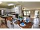 Kitchen and dining room features a seamless transition with lots of seating at 14335 Saint Johns Dr # 83, Stanfield, NC 28163