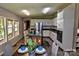 Bright kitchen with stainless appliances and island with seating for casual dining at 14335 Saint Johns Dr # 83, Stanfield, NC 28163