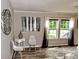 Elegant living room showcasing modern decor, sheer curtains, and hardwood flooring at 14335 Saint Johns Dr # 83, Stanfield, NC 28163