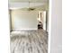 Spacious living room with hardwood floors and a ceiling fan offers a cozy space to relax at 14335 Saint Johns Dr # 83, Stanfield, NC 28163