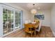 Cozy dining room with ample natural light with direct access to backyard patio at 16132 Mclester Rd, Oakboro, NC 28129