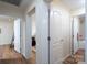 Hallway with hardwood floors with views to bath and bedroom at 16132 Mclester Rd, Oakboro, NC 28129