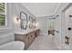 Spacious bathroom with marble floors, double vanities, soaking tub, and a walk-in shower at 1622 Hunters Place Rd, York, SC 29745