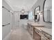 Modern bathroom offers a soaking tub, dual vanities, and a separate shower at 1622 Hunters Place Rd, York, SC 29745