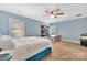 Bedroom featuring a bed, blue walls, carpet, a ceiling fan, and lots of natural light at 1622 Hunters Place Rd, York, SC 29745
