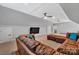 Bonus room with comfortable seating, large TV, and access to the hallway, perfect for relaxation and entertainment at 1622 Hunters Place Rd, York, SC 29745