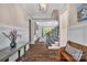 Inviting foyer featuring hardwood floors, a bench, and views of the living space at 1622 Hunters Place Rd, York, SC 29745