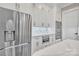 This kitchen features stainless steel appliances, custom cabinets, and quartz countertops at 1622 Hunters Place Rd, York, SC 29745