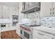Modern kitchen features high-end stainless steel appliances and ample counter space, ideal for cooking at 1622 Hunters Place Rd, York, SC 29745