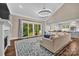 Spacious living room with fireplace, sliding doors to the patio, open to kitchen with large island at 1622 Hunters Place Rd, York, SC 29745
