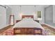 Relaxing main bedroom with hardwood floors, bedside tables, and neutral colors at 1622 Hunters Place Rd, York, SC 29745