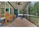 Inviting screened porch with comfortable seating and ceiling fan, offering a relaxing outdoor living space at 1622 Hunters Place Rd, York, SC 29745