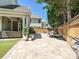 This backyard has a wonderful paver patio with a covered area and plenty of room for outdoor dining at 17732 Kings Point Dr, Cornelius, NC 28031