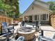 This spacious backyard has a paver patio and firepit with plenty of room for furniture at 17732 Kings Point Dr, Cornelius, NC 28031