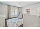 Charming Bedroom with a crib, armchair, rug, and plenty of natural light at 17732 Kings Point Dr, Cornelius, NC 28031