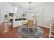 Cozy dining area features a round table, area rug, and stylish light fixture, perfect for intimate meals at 17732 Kings Point Dr, Cornelius, NC 28031
