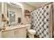Functional bathroom with granite countertop vanity and patterned shower curtain at 1791 Rosewell Dr # 65, Rock Hill, SC 29732