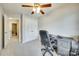 Cozy bedroom featuring a ceiling fan, gray walls, neutral carpet and a spacious closet for ample storage at 1791 Rosewell Dr # 65, Rock Hill, SC 29732