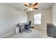 Neutral bedroom featuring carpet floors, ceiling fan, and desk at 1791 Rosewell Dr # 65, Rock Hill, SC 29732