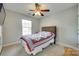Cozy bedroom with carpeted floors and natural light from the window at 1791 Rosewell Dr # 65, Rock Hill, SC 29732