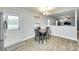 Bright breakfast nook with a table, four chairs, and easy access to the backyard at 1791 Rosewell Dr # 65, Rock Hill, SC 29732