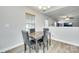 Bright breakfast nook with a table and four chairs, connecting to other areas at 1791 Rosewell Dr # 65, Rock Hill, SC 29732