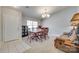 Formal dining room featuring a chandelier, adjacent to the front door and living area at 1791 Rosewell Dr # 65, Rock Hill, SC 29732