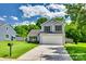 Charming two-story home with a well-maintained lawn and attached two-car garage at 1791 Rosewell Dr # 65, Rock Hill, SC 29732