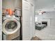 Convenient laundry room with modern appliances next to the living room at 1791 Rosewell Dr # 65, Rock Hill, SC 29732