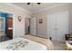 The bedroom features neutral paint, hardwood floors, white doors and frames, and an inviting decor at 18118 Pompano Pl, Cornelius, NC 28031