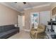 Comfortable seating in this living room boasts a relaxed environment for all at 18118 Pompano Pl, Cornelius, NC 28031
