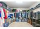 Spacious walk-in closet featuring wire shelving and plenty of storage space at 1905 Yellow Daisy Dr, Matthews, NC 28104