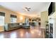 Spacious living room with hardwood flooring and seamless access to the kitchen at 1905 Yellow Daisy Dr, Matthews, NC 28104