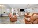 Inviting finished basement with fireplace, comfortable seating, and accent wall at 205 Wingate Dr, Stanley, NC 28164