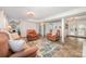 Spacious finished basement offering comfortable seating, an entertainment area, and access to the outside at 205 Wingate Dr, Stanley, NC 28164