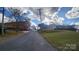 Street view showing the home's location within a residential neighborhood at 210 Mahan Sw St, Concord, NC 28025