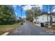 Street view showing the home's location within a residential neighborhood at 210 Mahan Sw St, Concord, NC 28025