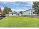 Fenced backyard with lush lawn at 2117 Yadkin Ave, Charlotte, NC 28205