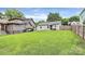 Large grassy backyard with privacy fence at 2117 Yadkin Ave, Charlotte, NC 28205