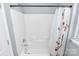 Simple bathroom with a shower-tub combination and a decorative shower curtain at 2117 Yadkin Ave, Charlotte, NC 28205