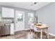 Charming dining area with tile floors, a modern table set, and natural light at 2117 Yadkin Ave, Charlotte, NC 28205