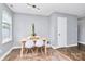 Bright dining space with tile floor, a table, and natural light from a window at 2117 Yadkin Ave, Charlotte, NC 28205