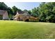 Back of house with deck and expansive backyard at 2168 Sunset Cir, Fort Mill, SC 29715